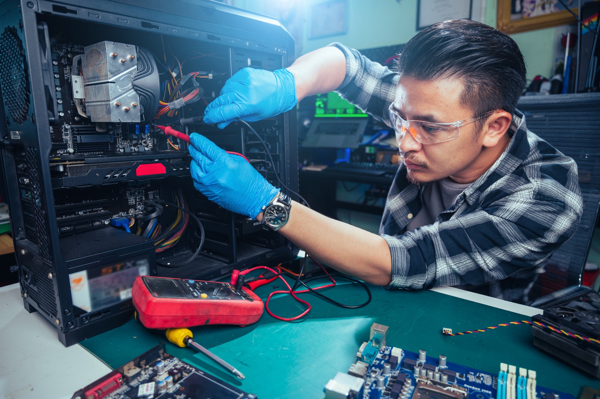 The technician repairing the computer. the concept of computer, CPU, motherboard, hardware, repairing, upgrade and technology.